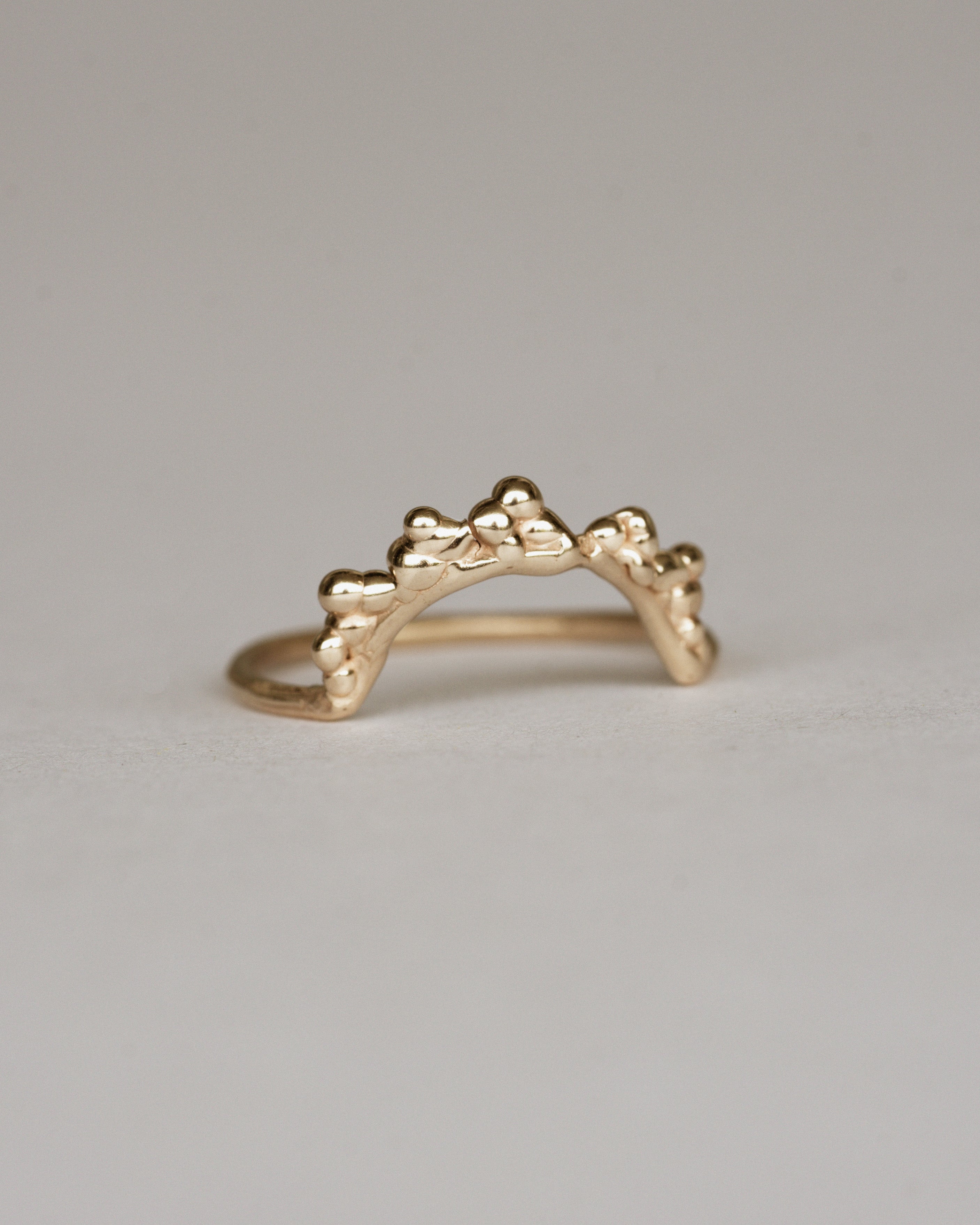 Arch droplet ring