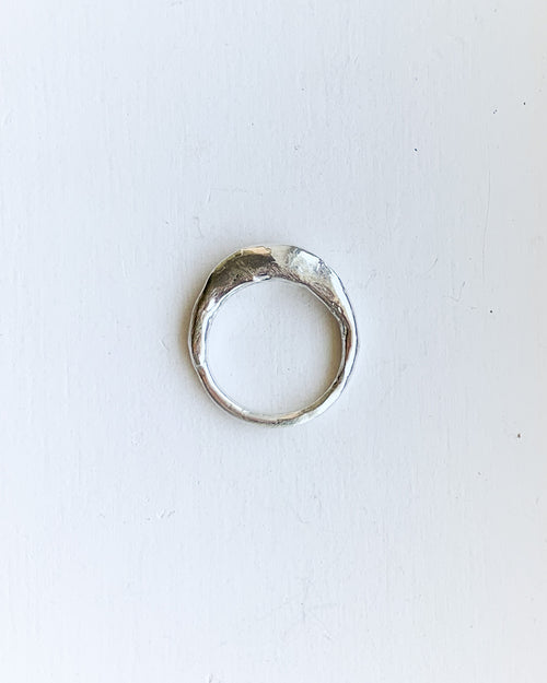 a hand formed silver ring made from cast wax 